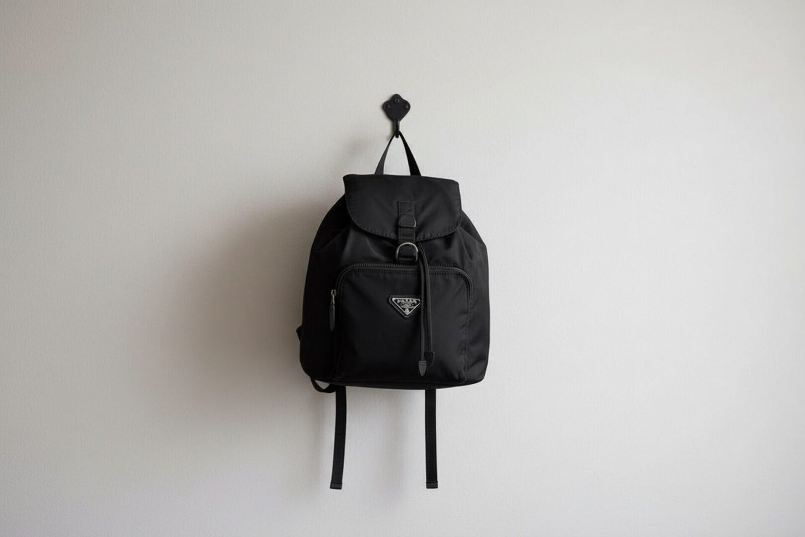 Simple black backpack on hook